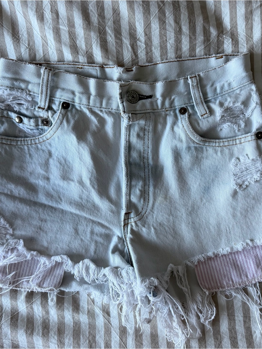 Levi’s Women's Light Blue Distressed Denim Shorts